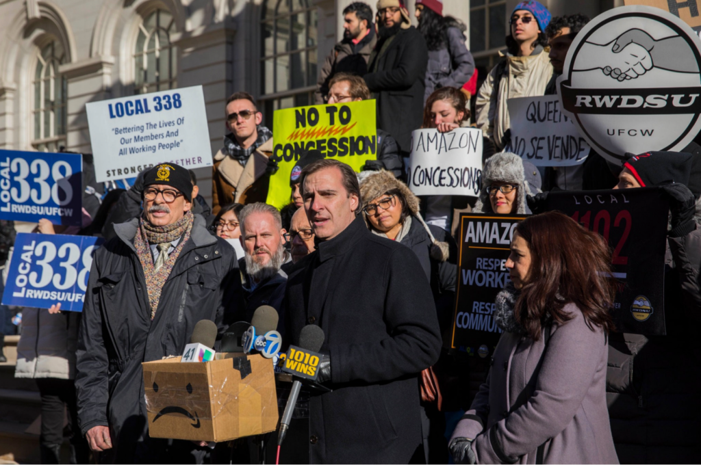 Amazon HQ2 protesters organize outside NYC City Hall